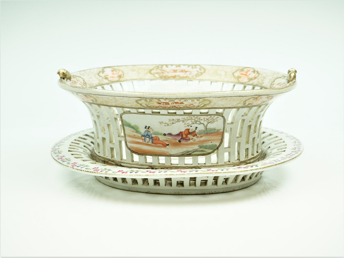 A Chinese export porcelain reticulated  chestnut basket on stand