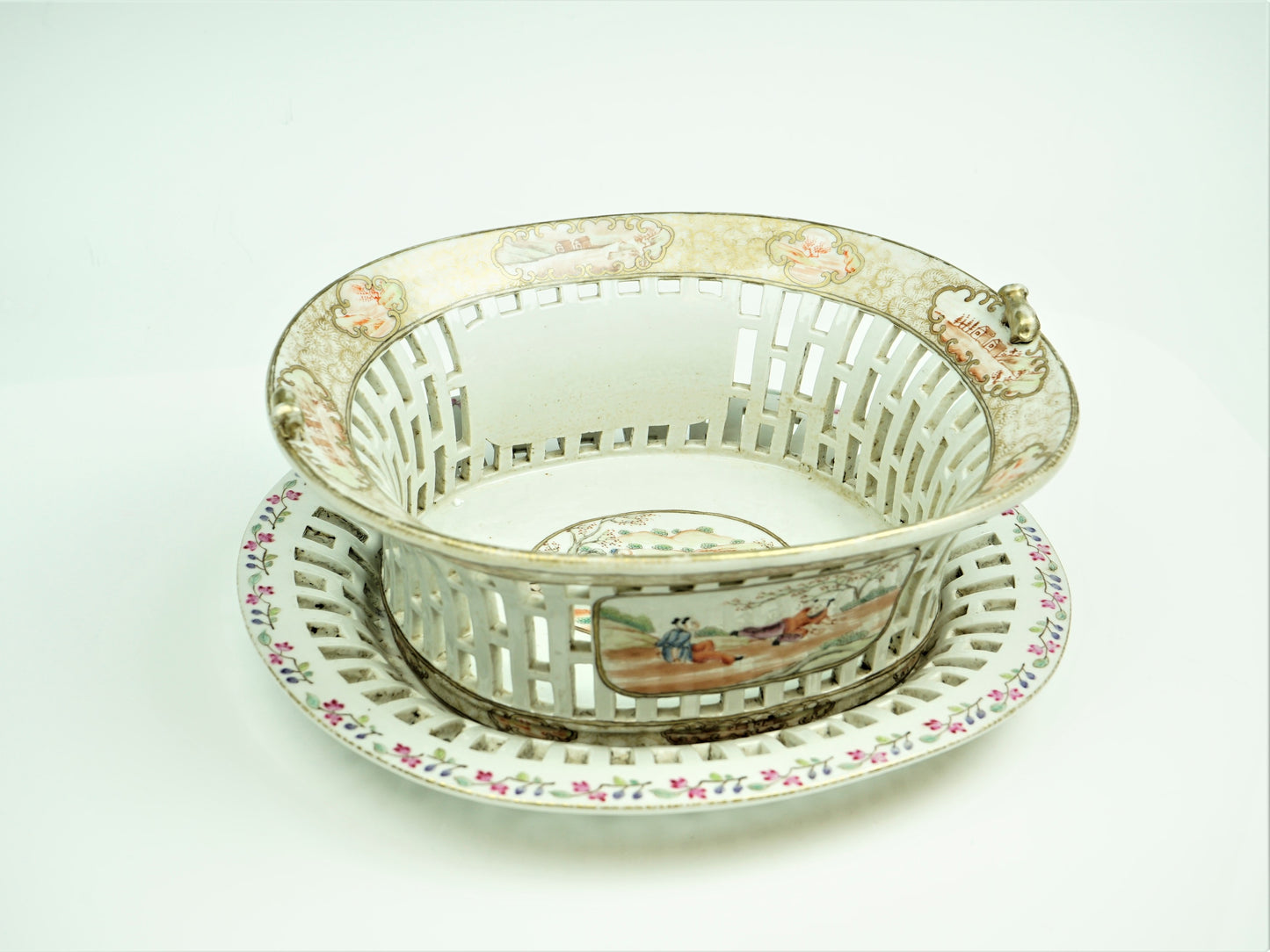 A Chinese export porcelain reticulated  chestnut basket on stand