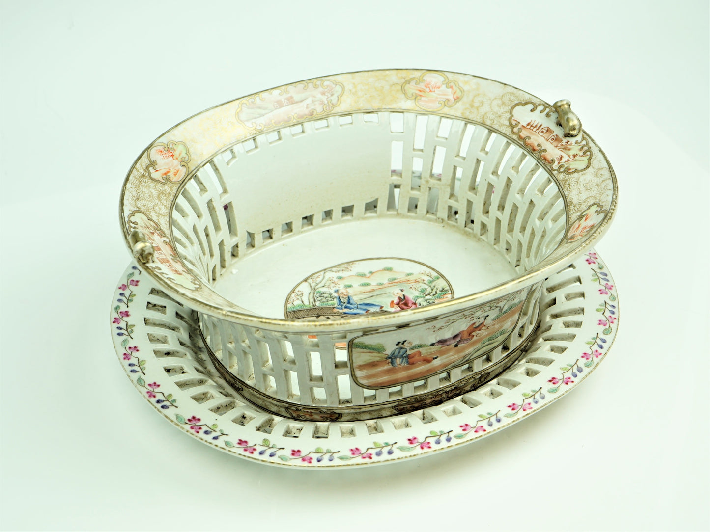 A Chinese export porcelain reticulated  chestnut basket on stand