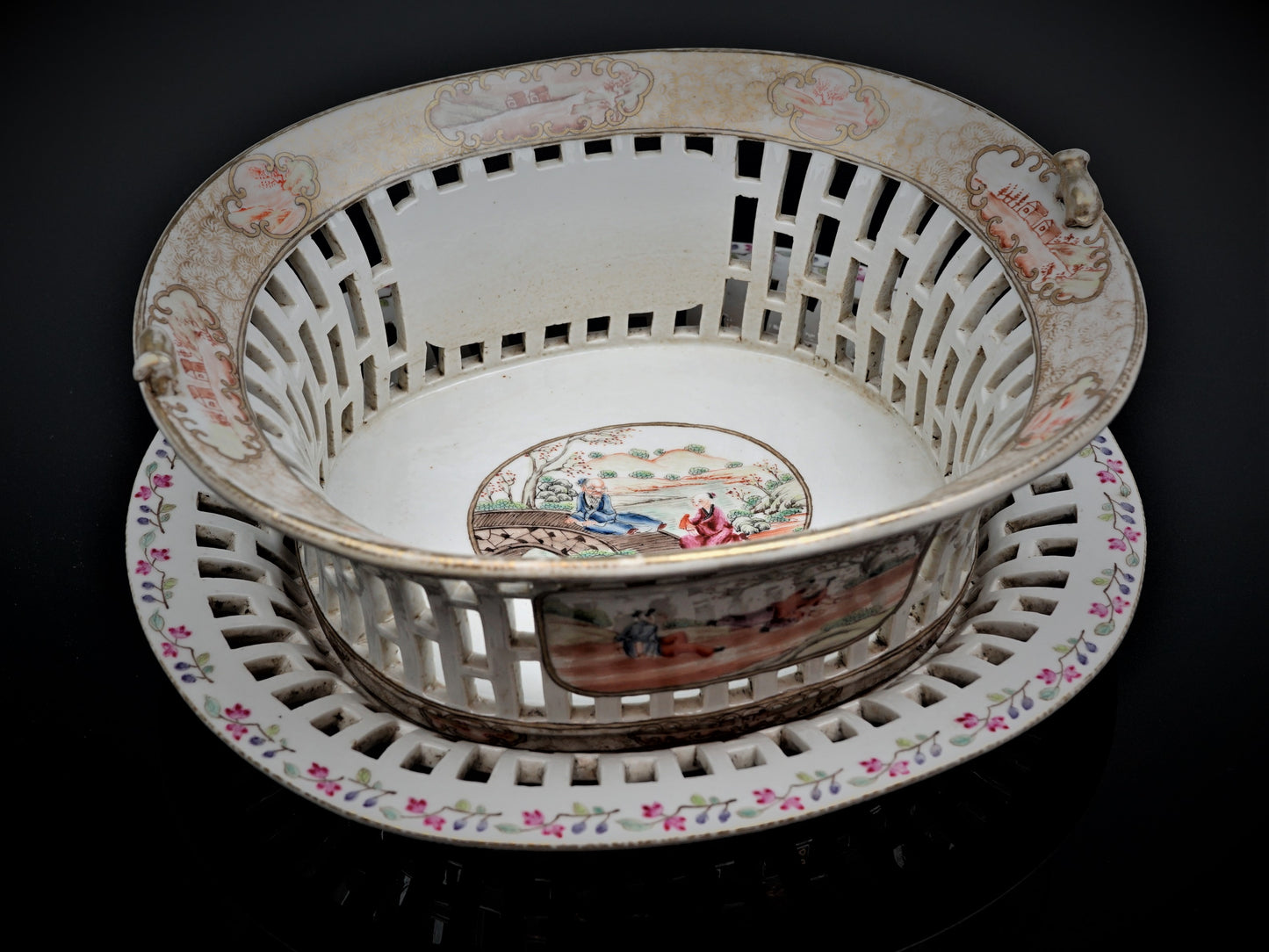 A Chinese export porcelain reticulated  chestnut basket on stand