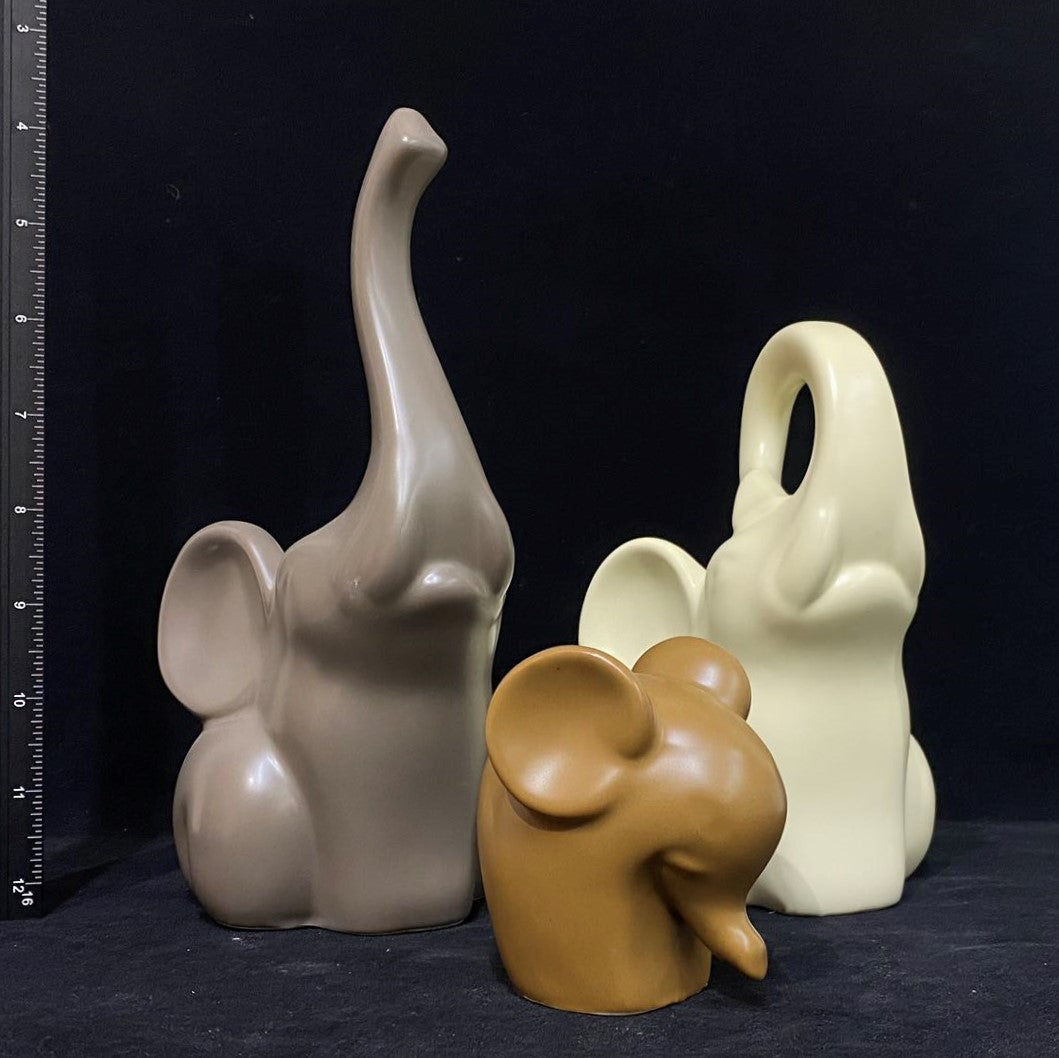 Ceramic elephant family figurine
