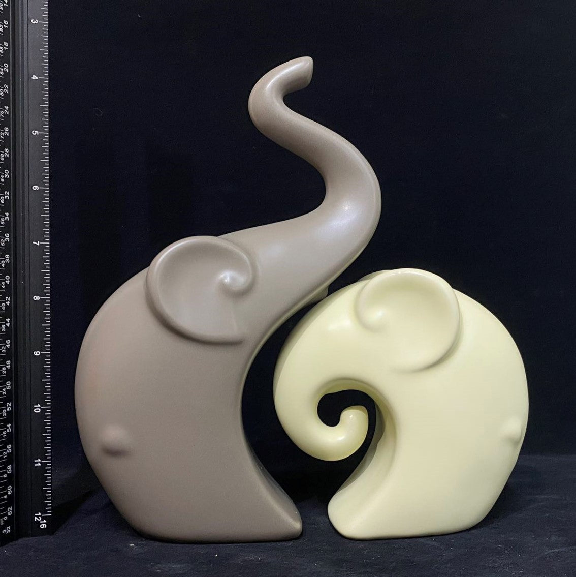 Ceramic elephant couple figurine